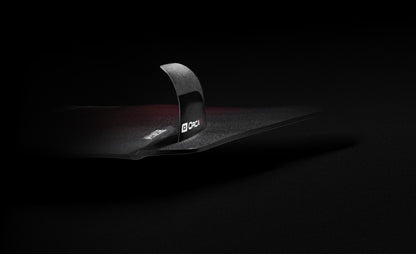 ORCA Pro x CORE fins mounted on twin-tip kiteboard heel-side